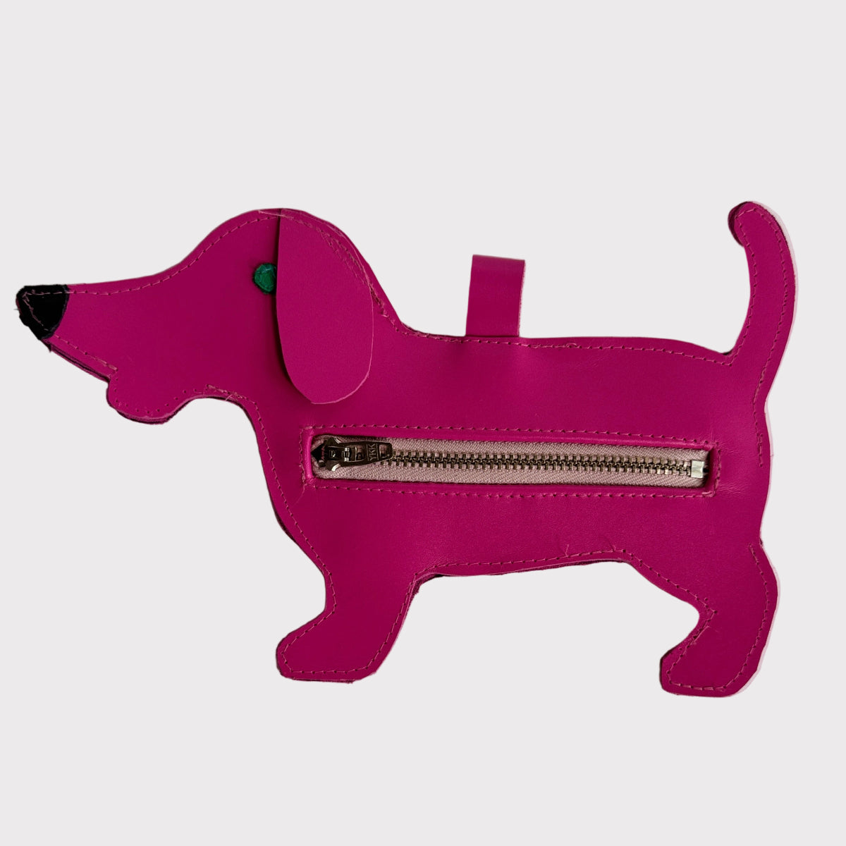 Pink dog-shaped dog-waste-bag-dispenser- with a zipper on a white background